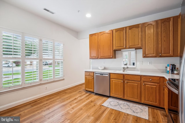 701 Ballast Way, Annapolis, MD 21401 - kitchen featuring stainless steel dishwasher, electric range oven, light wood finished floors, light countertops, and recessed lighting