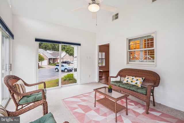 701 Ballast Way, Annapolis, MD 21401 - living area featuring baseboards, a ceiling fan, high vaulted ceiling, and carpet floors