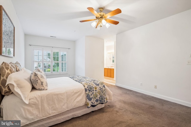 701 Ballast Way, Annapolis, MD 21401 - bedroom featuring carpet flooring, baseboards, a ceiling fan, and connected bathroom