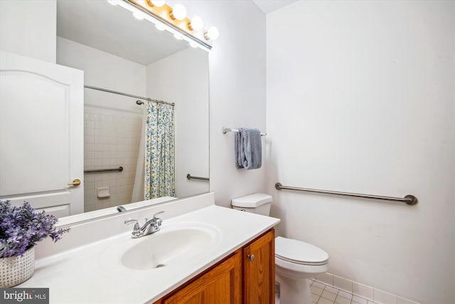 701 Ballast Way, Annapolis, MD 21401 - bathroom with toilet, vanity, tile patterned floors, and curtained shower