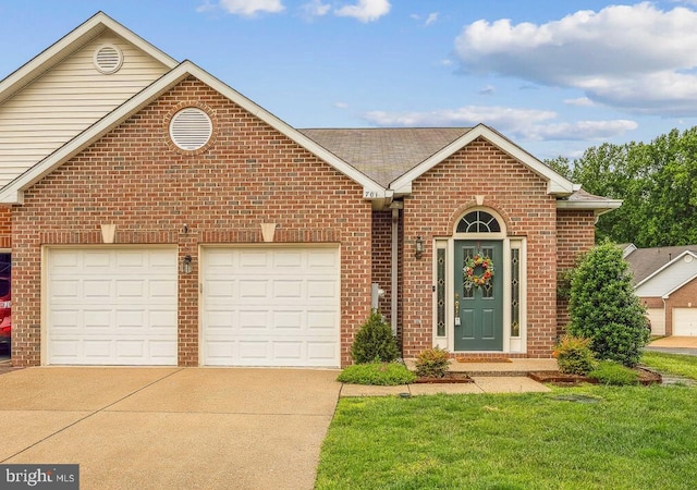 701 Ballast Way, Annapolis, MD 21401 - view of front facade featuring brick siding, concrete driveway, an attached garage, and roof with shingles