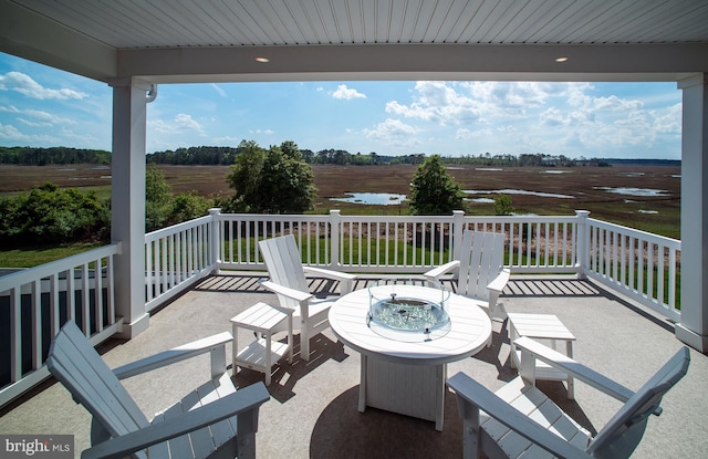 view of patio featuring an outdoor fire pit