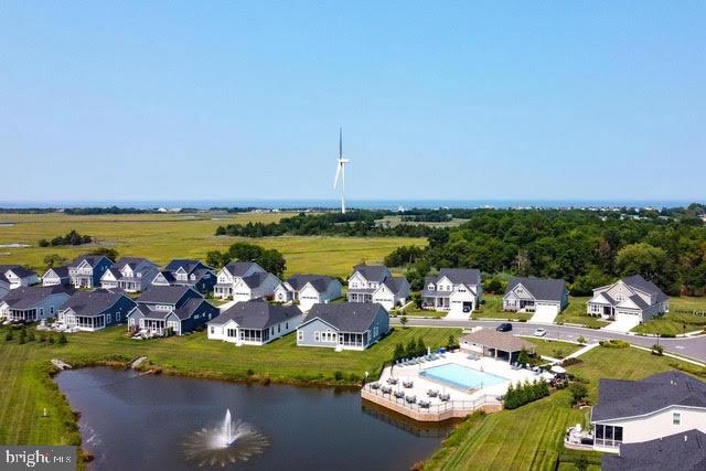 aerial view with a water view and a residential view