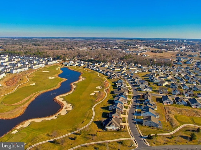 bird's eye view featuring a water view, golf course view, and a residential view