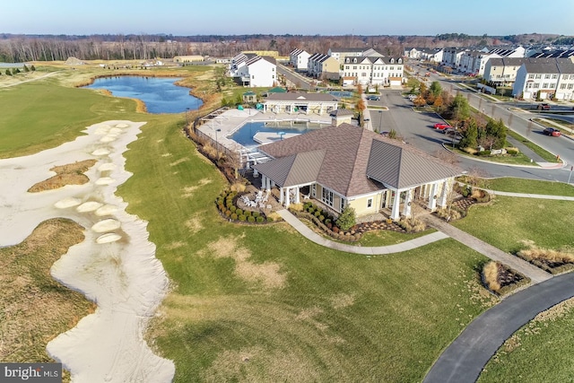 aerial view featuring a water view and a residential view