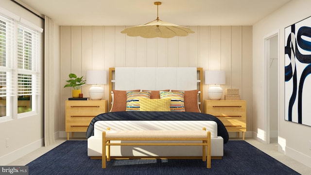 carpeted bedroom with baseboards