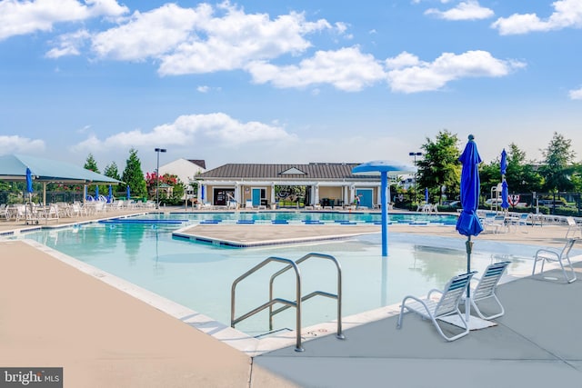pool with a patio
