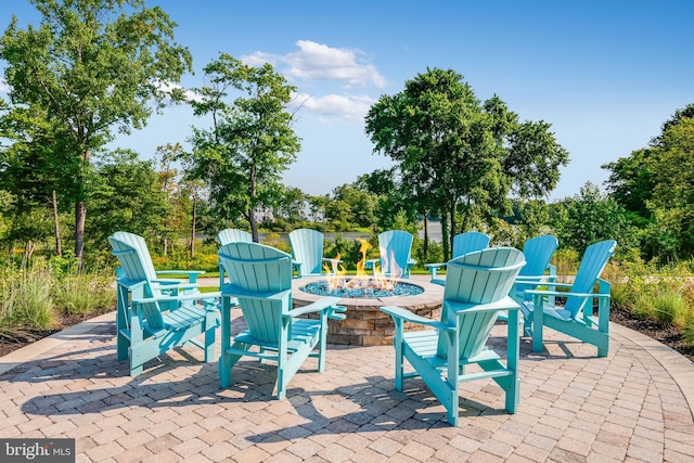 view of patio / terrace featuring a fire pit