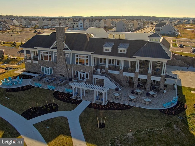 aerial view at dusk with a residential view