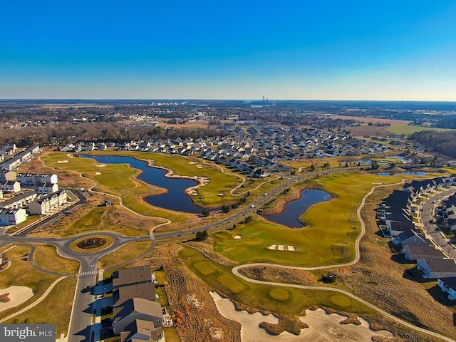 birds eye view of property featuring a water view and a residential view