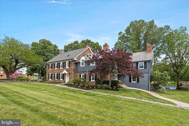 4285 Applebutter Rd, Perkasie, PA 18944 - view of front facade with a chimney and a front yard