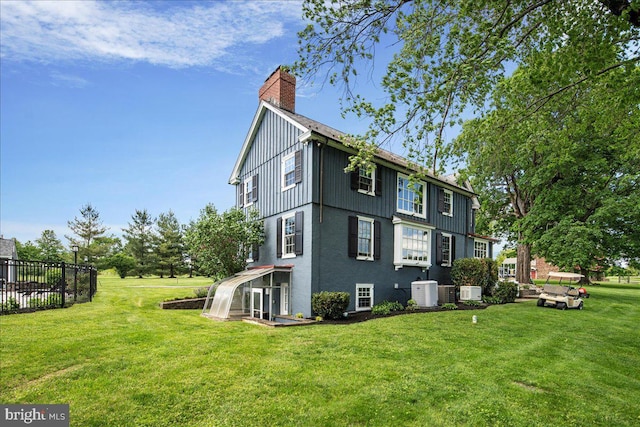 4285 Applebutter Rd, Perkasie, PA 18944 - view of side of property featuring a chimney and a yard