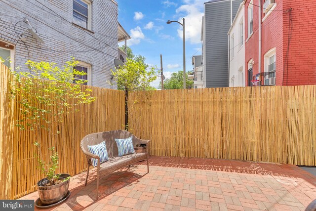 view of patio / terrace with fence