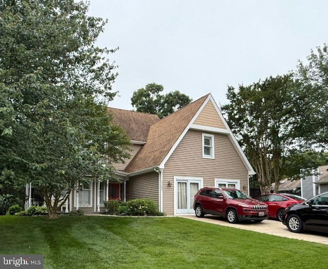 21645 Thistle Pl, Lexington Park, MD 20653 - view of front of house featuring a front lawn and roof with shingles