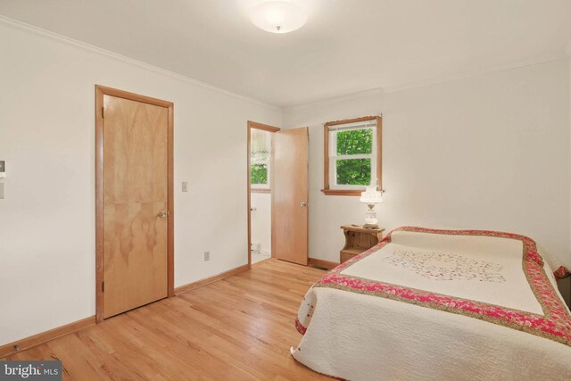 111 Trevanion Rd, Taneytown, MD 21787 - bedroom featuring wood finished floors, baseboards, and ornamental molding