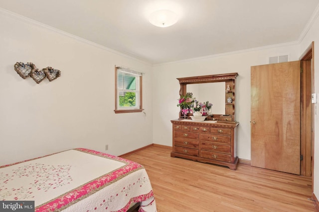 111 Trevanion Rd, Taneytown, MD 21787 - bedroom featuring ornamental molding, light wood-type flooring, and baseboards