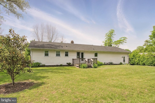 111 Trevanion Rd, Taneytown, MD 21787 - back of house with a wooden deck, a yard, and a chimney