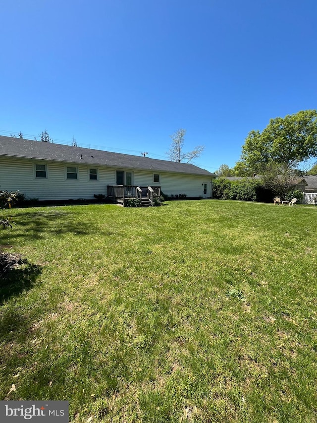 111 Trevanion Rd, Taneytown, MD 21787 - back of house featuring a lawn and a wooden deck