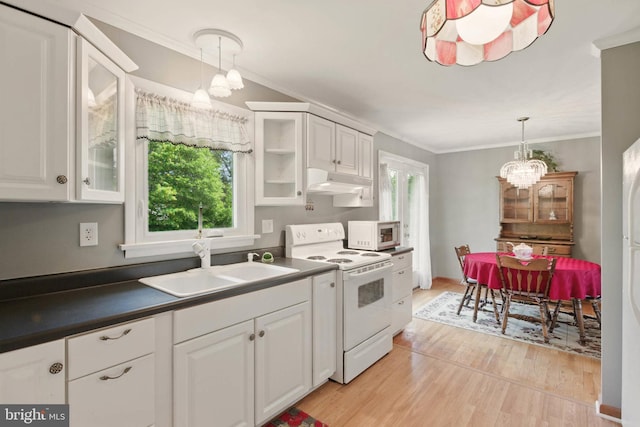 111 Trevanion Rd, Taneytown, MD 21787 - kitchen featuring white appliances, a chandelier, under cabinet range hood, healthy amount of natural light, and crown molding