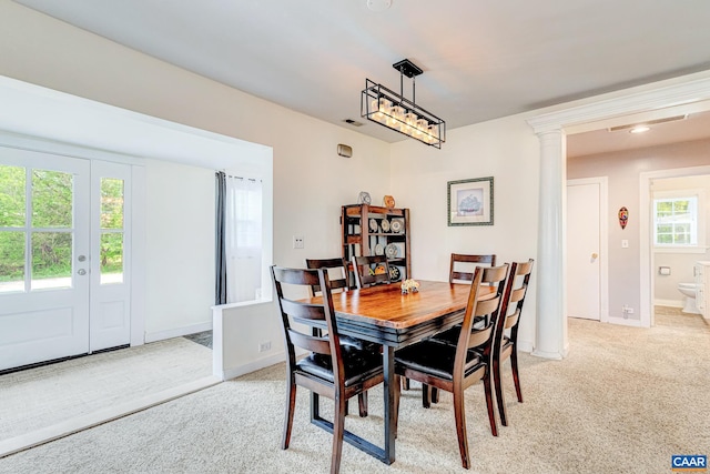 654 Bybee Rd, Louisa, VA 23093 - dining area featuring light carpet, decorative columns, and baseboards