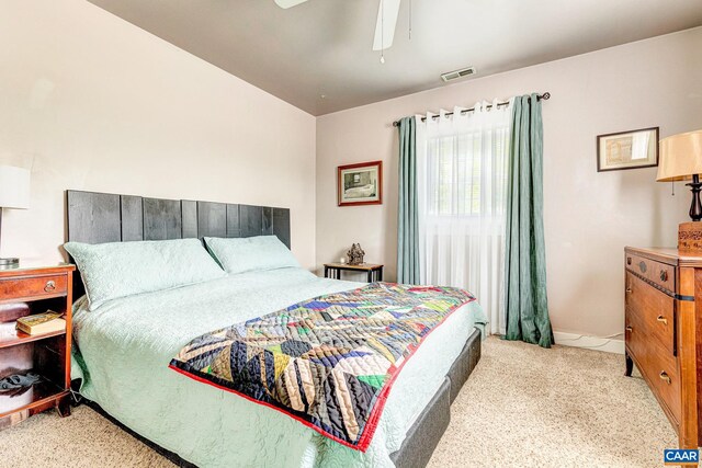654 Bybee Rd, Louisa, VA 23093 - bedroom featuring light carpet, a ceiling fan, and baseboards