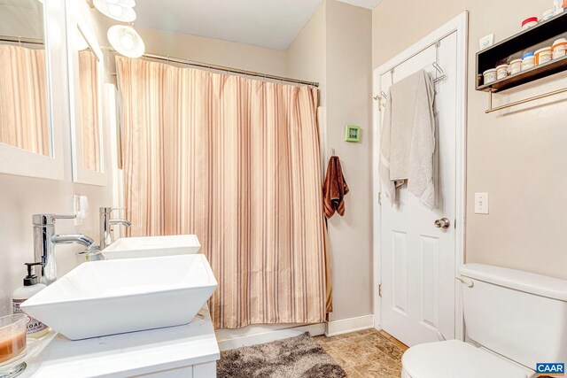 654 Bybee Rd, Louisa, VA 23093 - full bath with toilet, curtained shower, tile patterned floors, and double vanity