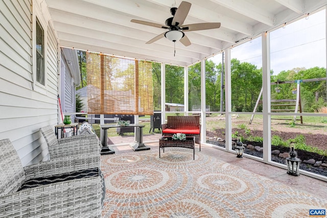 654 Bybee Rd, Louisa, VA 23093 - sunroom / solarium with healthy amount of natural light, ceiling fan, beam ceiling, and an outdoor hangout area