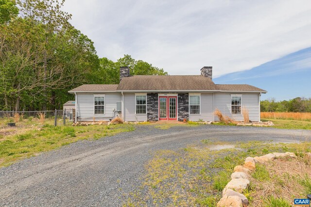 654 Bybee Rd, Louisa, VA 23093 - view of front of home featuring french doors, a chimney, and fence