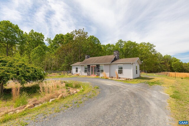 654 Bybee Rd, Louisa, VA 23093 - single story home featuring fence, a chimney, and curved driveway