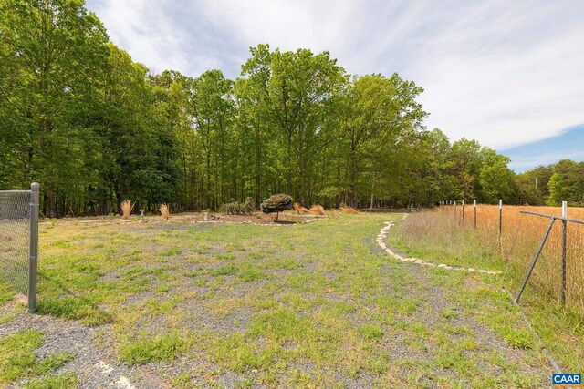 654 Bybee Rd, Louisa, VA 23093 - view of yard featuring fence and a forest view