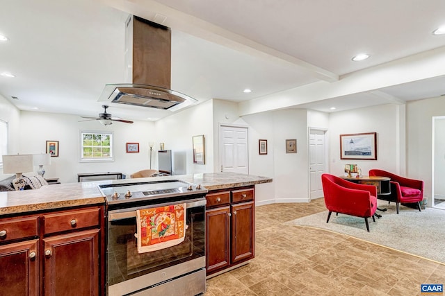 654 Bybee Rd, Louisa, VA 23093 - kitchen with electric stove, island range hood, recessed lighting, light countertops, and ceiling fan