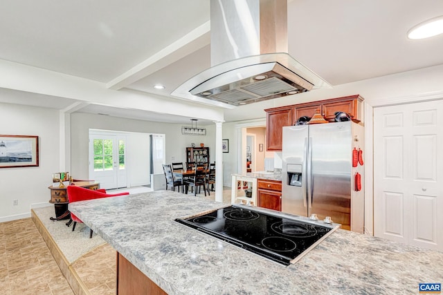 654 Bybee Rd, Louisa, VA 23093 - kitchen featuring stainless steel fridge with ice dispenser, island exhaust hood, cooktop, brown cabinetry, and recessed lighting