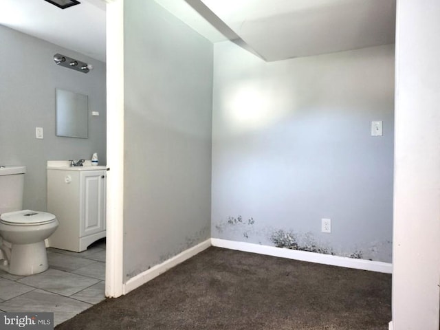 4503 Lasalle Ave, Baltimore, MD 21206 - bathroom with toilet, baseboards, and vanity