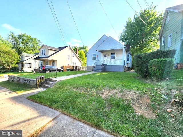 4503 Lasalle Ave, Baltimore, MD 21206 - bungalow-style house with a porch and a front yard