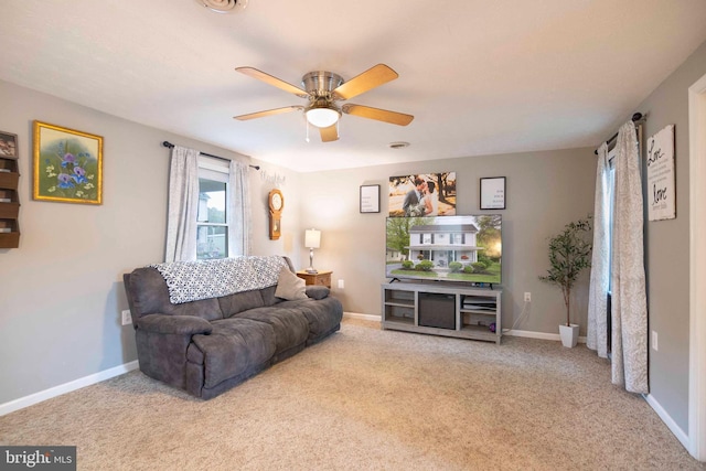 627 Ash St, Strasburg, VA 22657 - carpeted living area featuring ceiling fan and baseboards