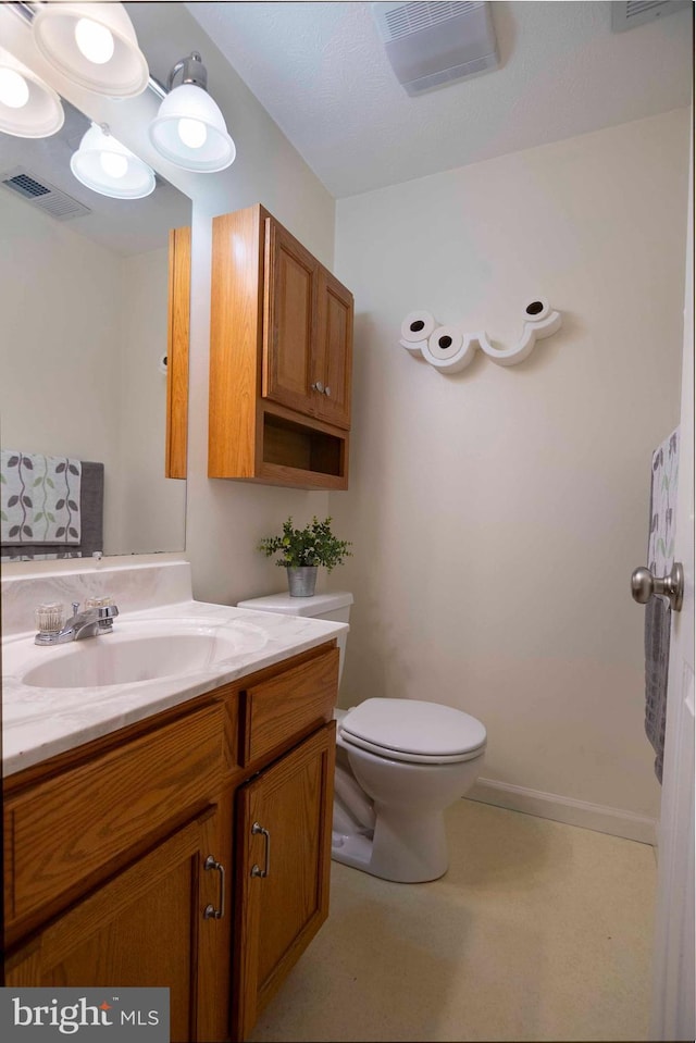 627 Ash St, Strasburg, VA 22657 - bathroom with toilet and vanity