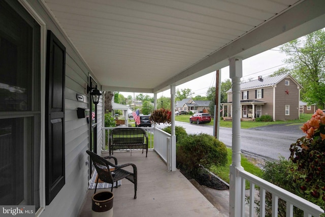 627 Ash St, Strasburg, VA 22657 - view of patio / terrace with covered porch and a residential view