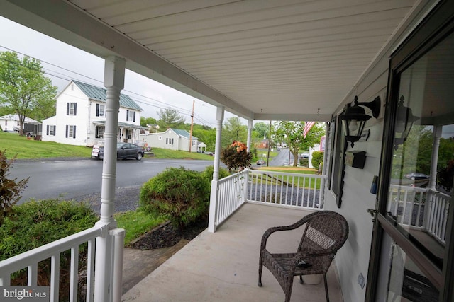 627 Ash St, Strasburg, VA 22657 - view of patio featuring covered porch and a residential view