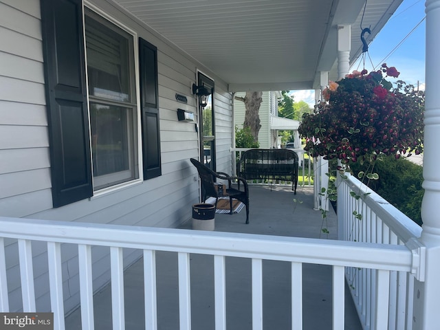 627 Ash St, Strasburg, VA 22657 - deck featuring covered porch