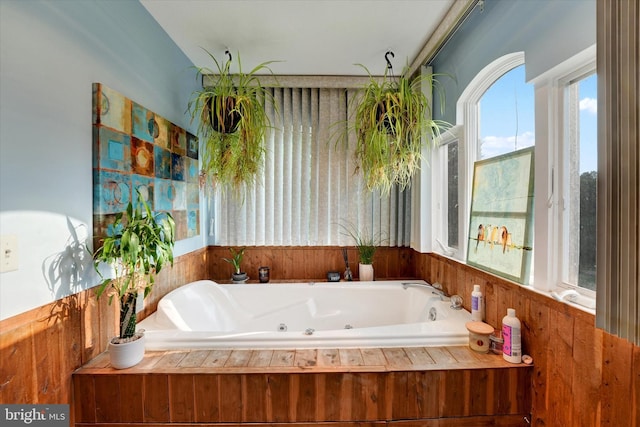 177 Pearce Creek Dr, Earleville, MD 21919 - bathroom featuring a jetted tub and wooden walls