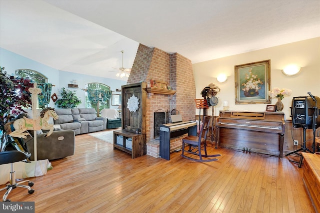 177 Pearce Creek Dr, Earleville, MD 21919 - office space with hardwood / wood-style floors, a brick fireplace, ceiling fan, and lofted ceiling