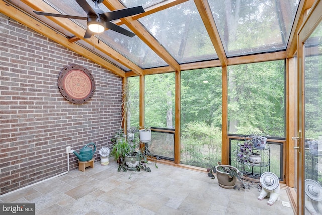 sunroom with a ceiling fan