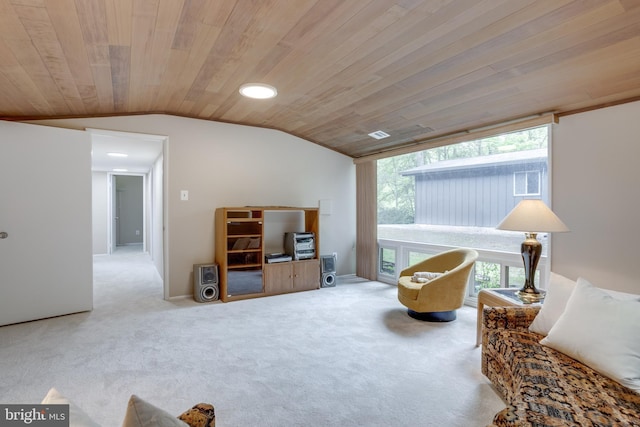 sitting room with wooden ceiling, lofted ceiling, plenty of natural light, and carpet flooring