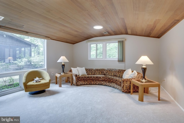carpeted living room featuring lofted ceiling, wood ceiling, and baseboards