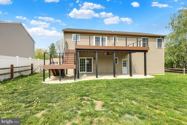 back of house featuring a patio area and ceiling fan