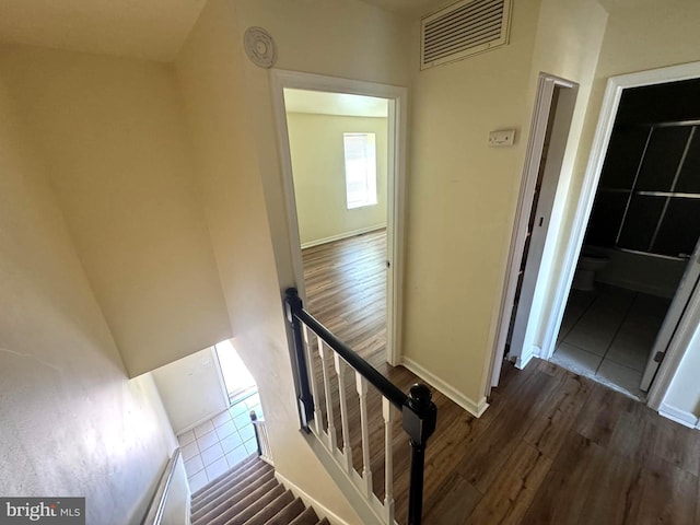 1165 S Division St, Salisbury, MD 21804 - staircase with baseboards, visible vents, and wood finished floors