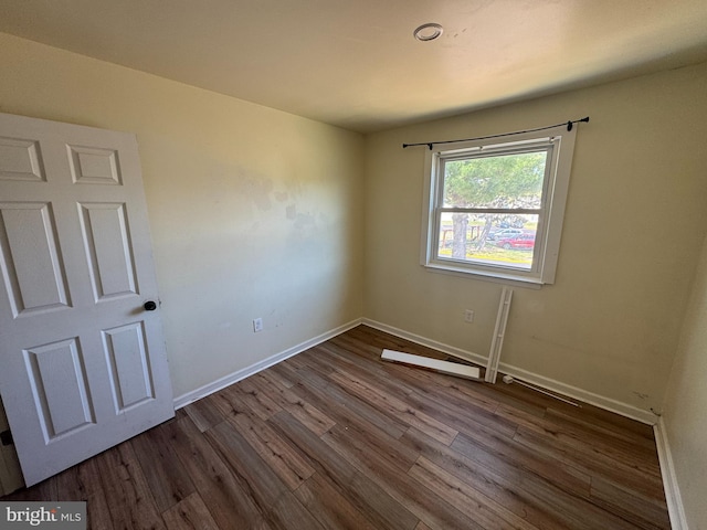 1165 S Division St, Salisbury, MD 21804 - empty room with baseboards and wood finished floors
