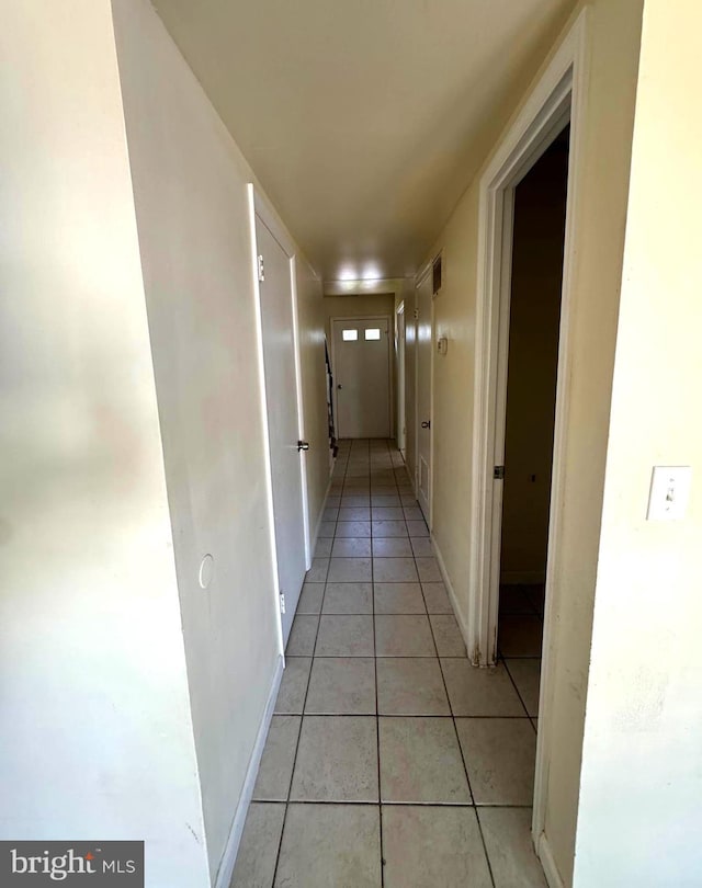 1165 S Division St, Salisbury, MD 21804 - hallway with light tile patterned floors and baseboards