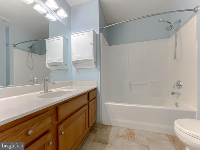 full bath with vanity, toilet, and shower / tub combination