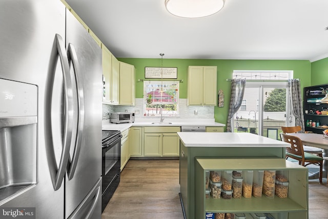 1 Deep Pond Dr, Spring City, PA 19475 - kitchen with freestanding refrigerator, black / electric stove, a sink, and wood finished floors
